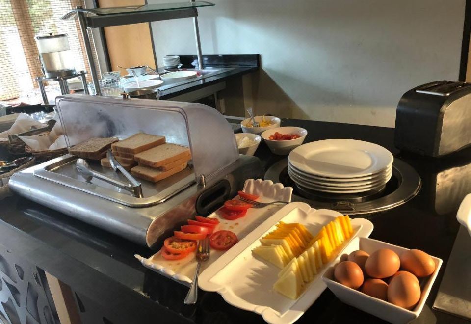 The Tides Restaurant breakfast spread at Aquarian Tide Hotel