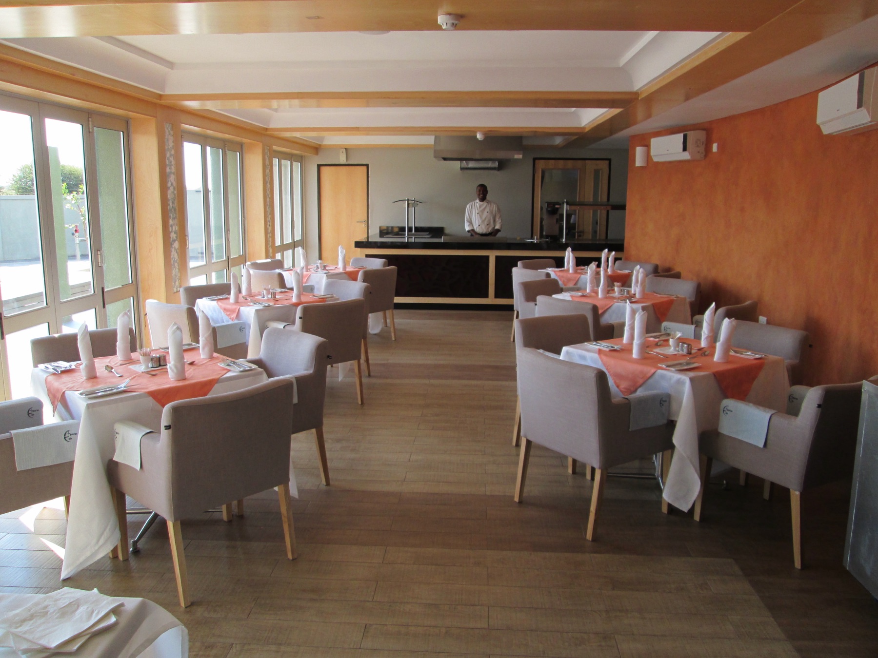 The Tides Restaurant at Aquarian Tide Hotel, poolside dining