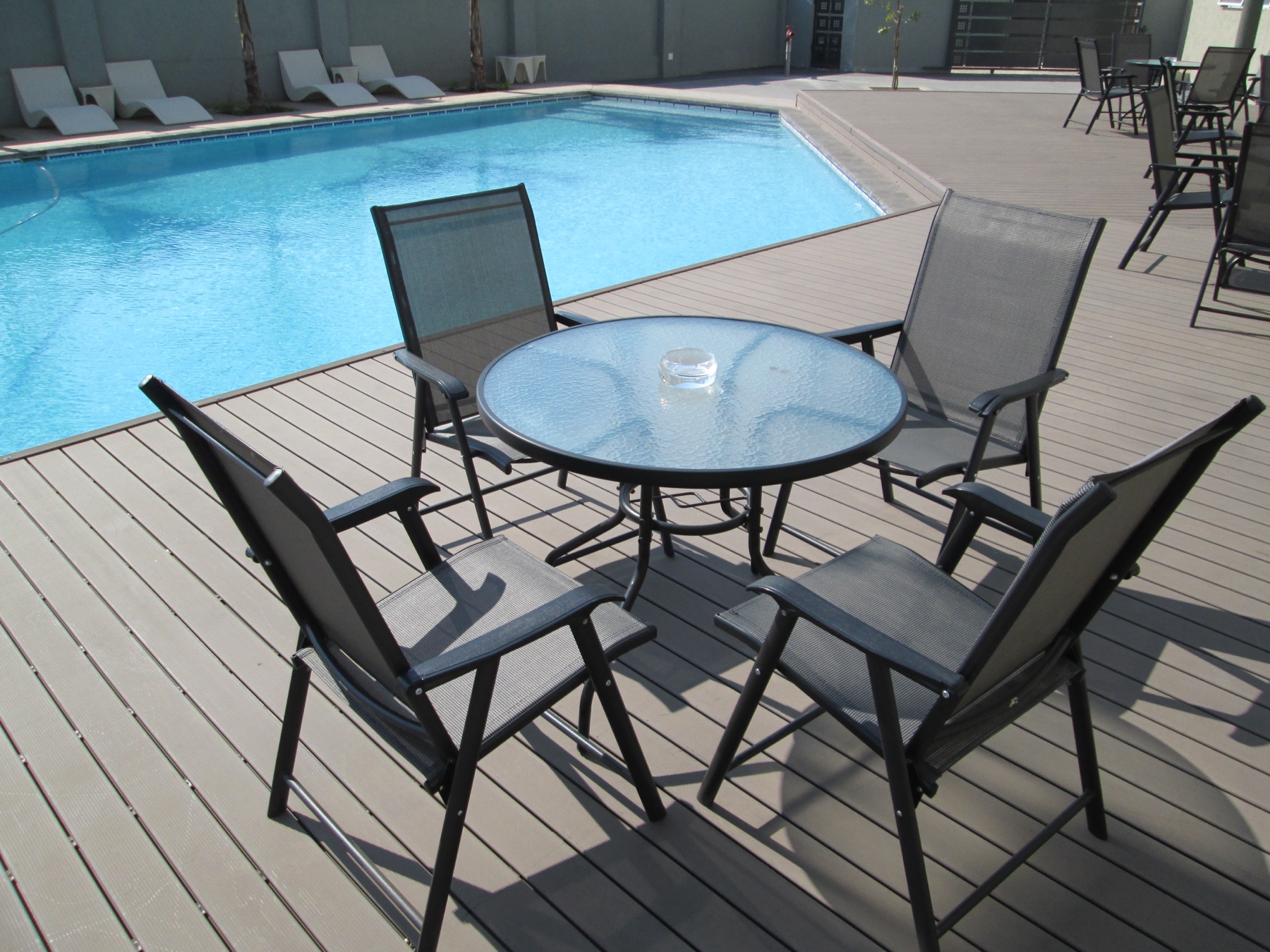 Pool area set up for a private event at Aquarian Tide Hotel